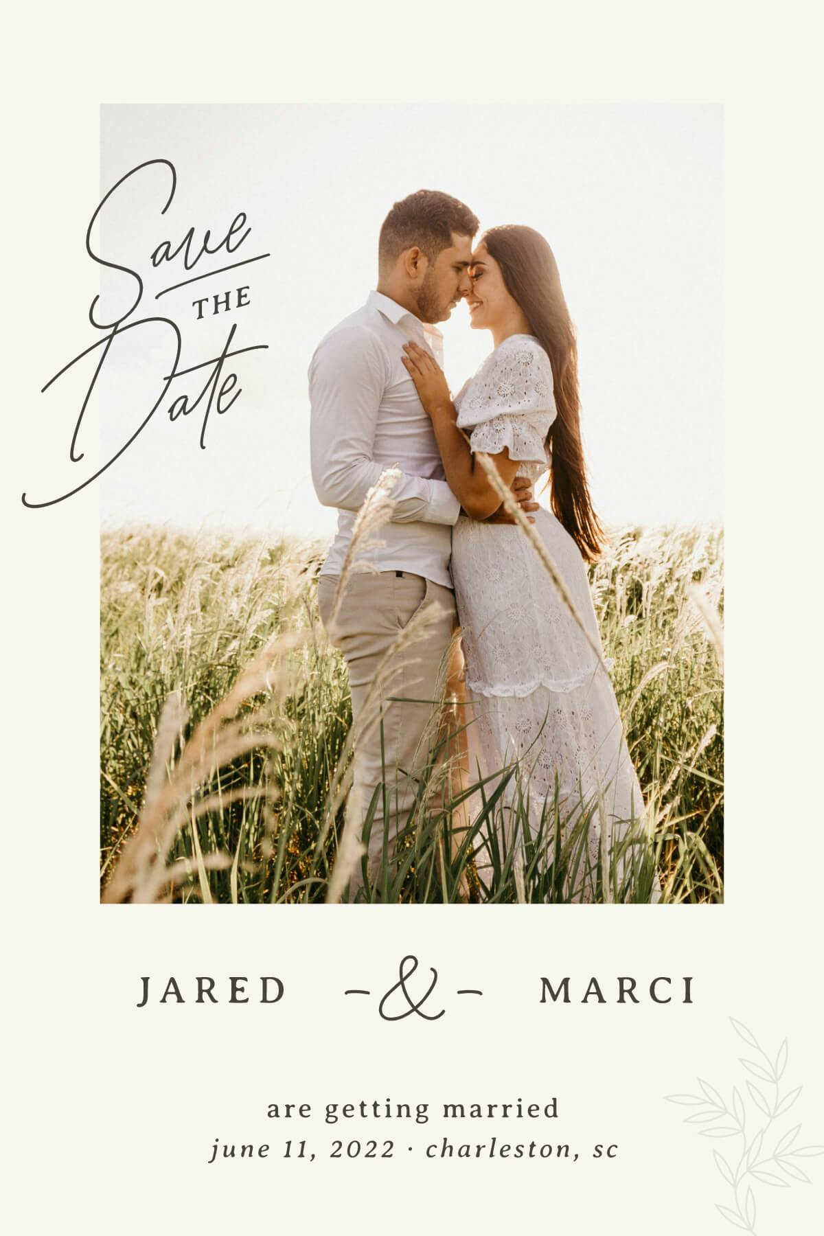 Happy couple on a modern "Save the Date" wedding invitation.